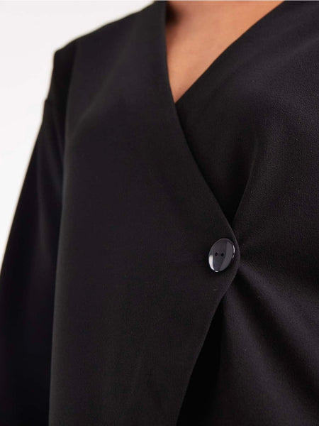 VM Asymmetric Wrap Front Long Sleeve Top In Black