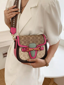 Clara Horsebit Monogram Faux Leather Shoulder Bag In Pink
