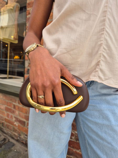 Chain Strap Hard Shell Chocolate Brown Clutch Bag With Gold Grab Handle