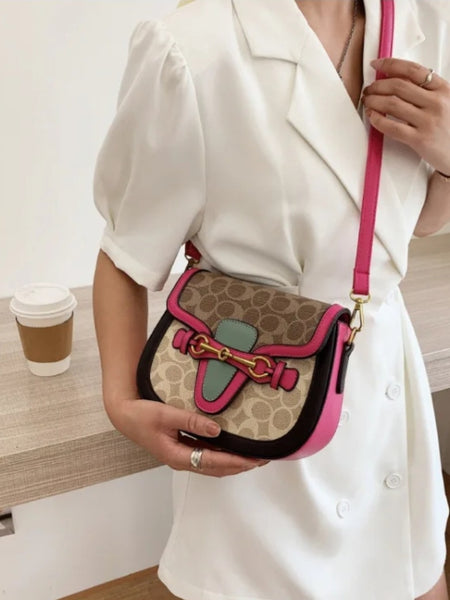 Clara Horsebit Monogram Faux Leather Shoulder Bag In Pink
